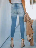 Cut Out Knees High Low Cropped Skinny Jeans